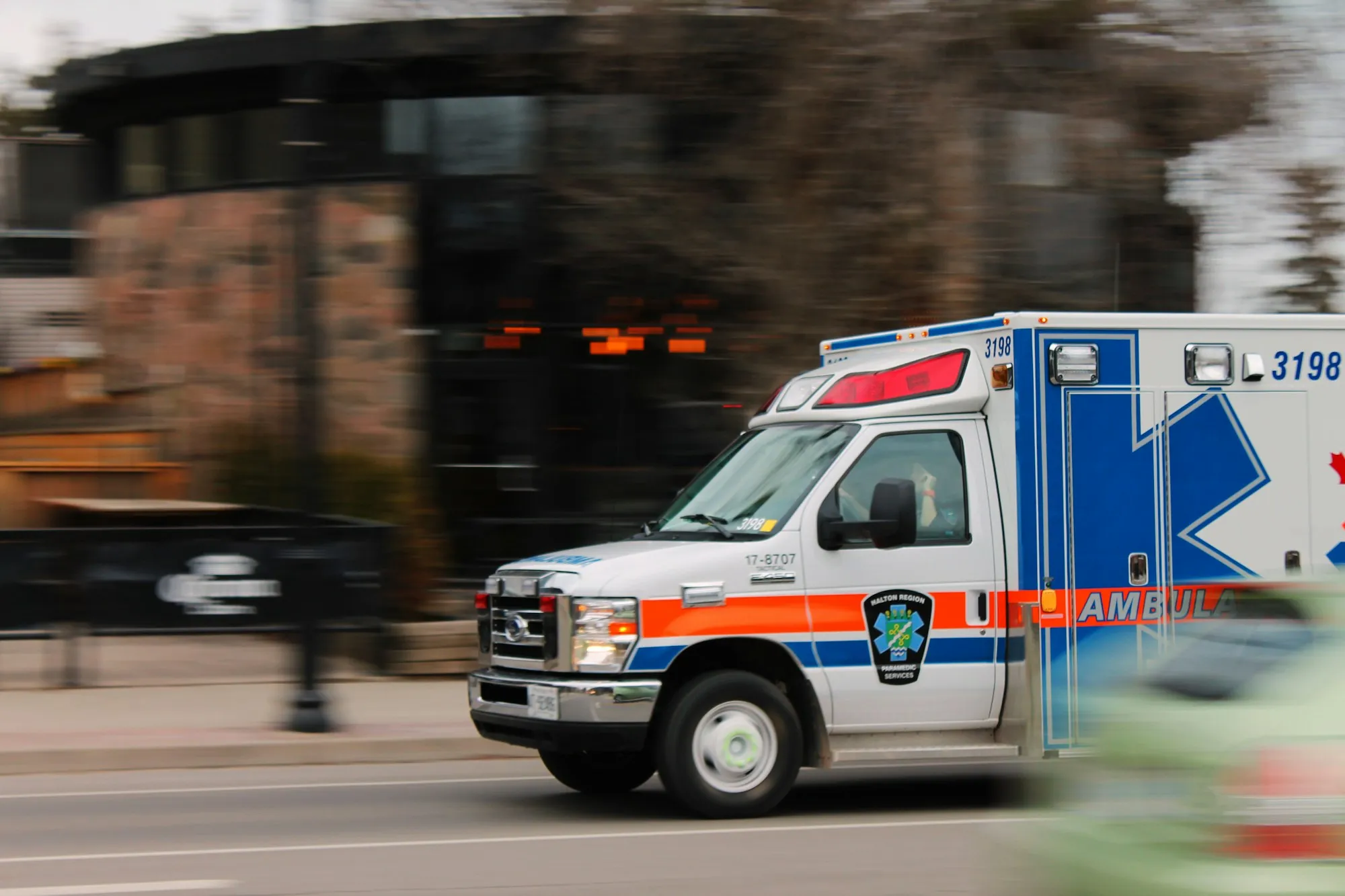 Ambulance with flashing lights responding to a medical emergency