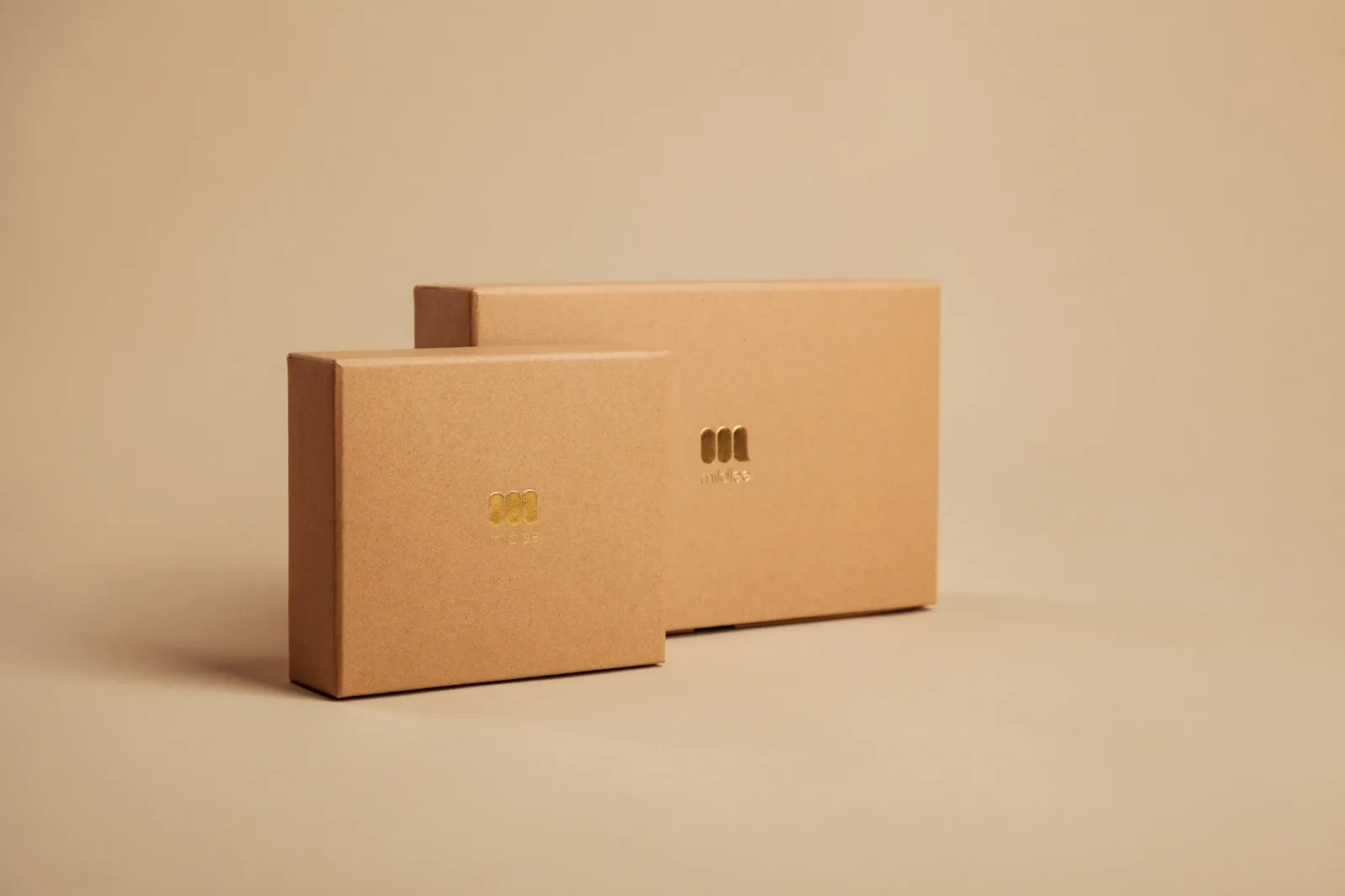 Two kraft cardboard shipping boxes, illustrating how to buy from Alaikas.com sellers